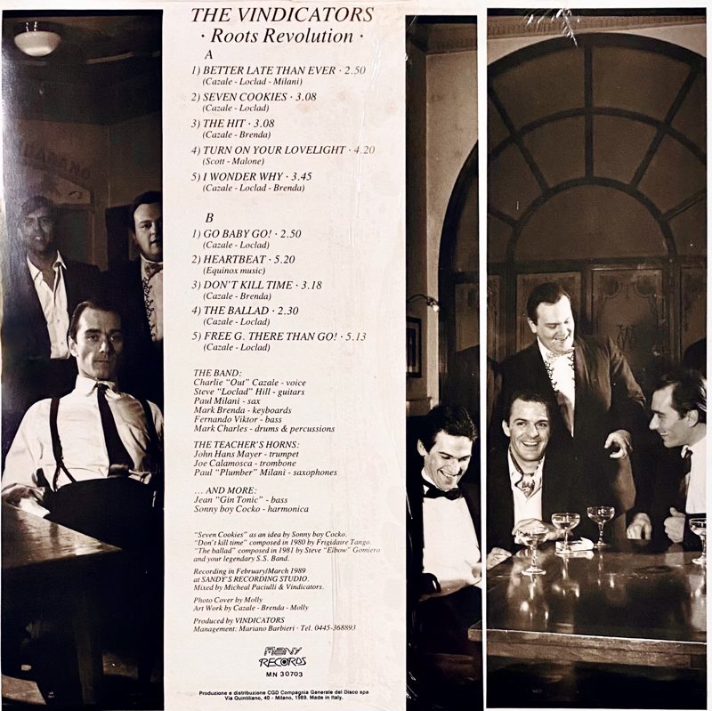 Back of Roots Revolution, with the tracklist